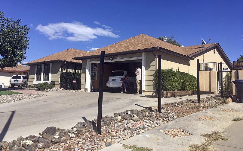 Poles for a new fence stand outside the house used in the AMC-TV series Breaking Bad in Albuquerque, N.M.