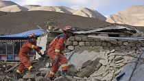 rescue workers conduct search and rescue for survivors in the aftermath of an earthquake in Changsuo Township of Dingri in Xigaze, southwestern China's Tibet Autonomous Region