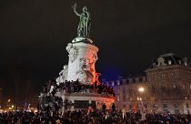 Left-leaning demonstrators celebrate the death of Jean-Marie Le Pen in Paris