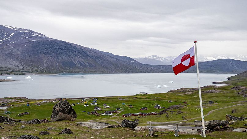 A view of a Greenland flag in the village of Igaliku in Greenland, Friday, July 5, 2024.
