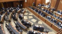 FILE - In this photo released by the Lebanese Parliament media office, Lebanese lawmakers attending a parliament session, in Beirut, Lebanon, April 18, 2023. 