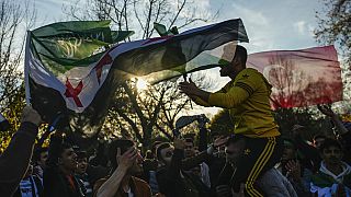 FILE: People gather to celebrate the Syrian government's fall in Istanbul, Turkey, on Dec. 8, 2024
