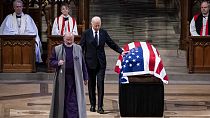 President Joe Biden touches Carter's coffin during his state funeral at the National Cathedral in Washington D.C., USA, 09.01.2025