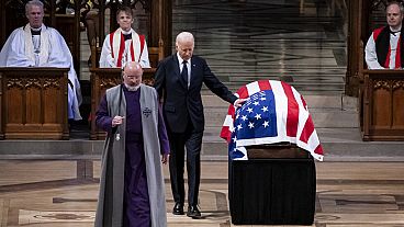 President Joe Biden touches Carter's coffin during his state funeral at the National Cathedral in Washington D.C., USA, 09.01.2025