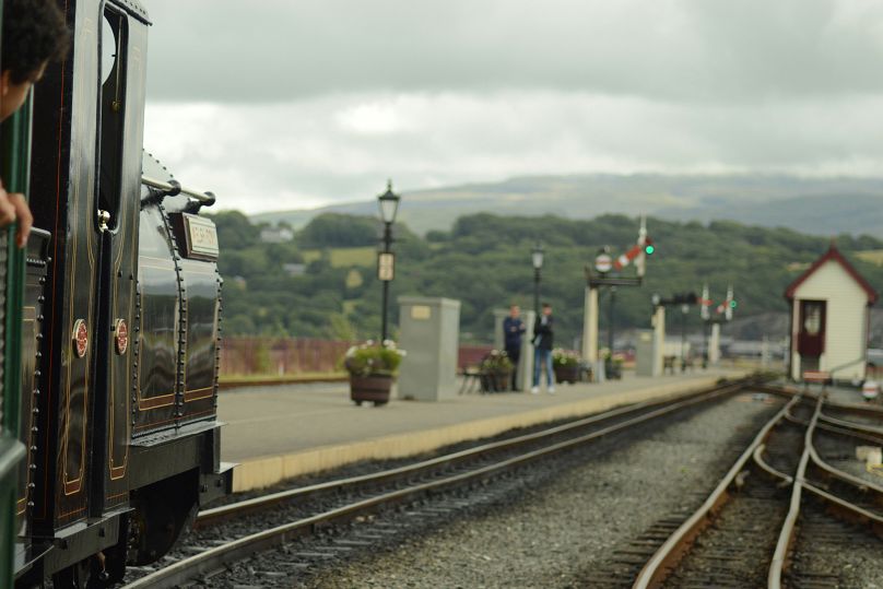 A Ffestiniog & Welsh Highland Railways, train on the railway tracks at Porthmadog.