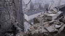 Damaged multi-storey apartment house is seen after Russian drone attack in Kyiv, Ukraine, Friday, Jan. 10, 2025. 