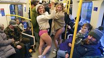 No trousers? No problem: London underground users bare their legs 