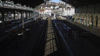 Railways are deserted at the Lyon Perrache train station, in Lyon, central France, Tuesday, Jan. 31, 2023