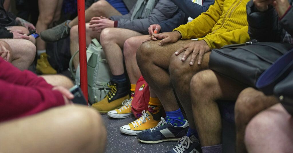 London underground users bare their legs for Official No Trousers Tube Ride