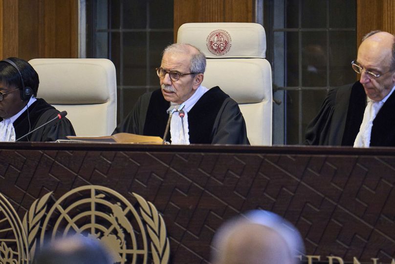 Presiding Judge Nawaf Salam reads the ruling in the International Court of Justice, or World Court, in The Hague, Netherlands, Friday July 19, 2024