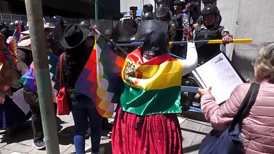 Supporters of former Bolivian president Evo Morales clash with police