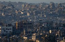 Destroyed buildings are seen inside the Gaza Strip from southern Israel, Monday, Jan. 13, 2025. 