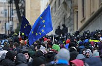 Demonstrators with EU flags rally outside the parliament to protest against the government's decision to suspend negotiations on joining the bloc in Tbilisi, Dec. 14, 2024