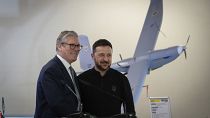 Keir Starmer, left, and Volodymyr Zelenskyy stand in front one of the drones built in Ukraine with funding from Britain in Kyiv, 16 January, 2025