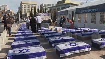 Protesters in Jerusalem stage coffin protest, urge PM Netanyahu to reject ceasefire agreement