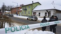 Police stand near the scene of a fatal stabbing at a secondary school in Spisska Stara Ves, Slovakia, on 16 January, 2025. 