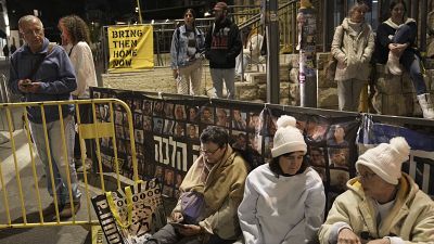 Relatives of hostages, held captive by Hamas in the Gaza Strip, and their supporters in Jerusalem, Wednesday, Jan. 15, 2025