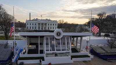 Workers continue with the finishing touches on the presidential reviewing stand by the White House Thursday, Jan 16 2025, ahead of President Trump inauguration