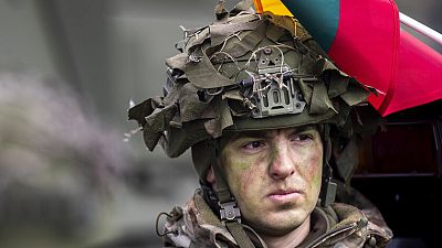 FILE: A Lithuanian Army soldier takes part in a military exercise near the Suwalki Gap near the Polish border at the Dirmiskes village, in Lithuania on Friday, April 26, 2024.