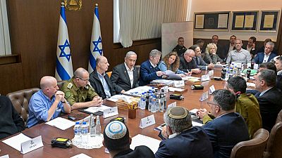 Israeli Prime Minister Benjamin Netanyahu, center, convened his security Cabinet to vote on a ceasefire deal after confirming an agreement had been reached.