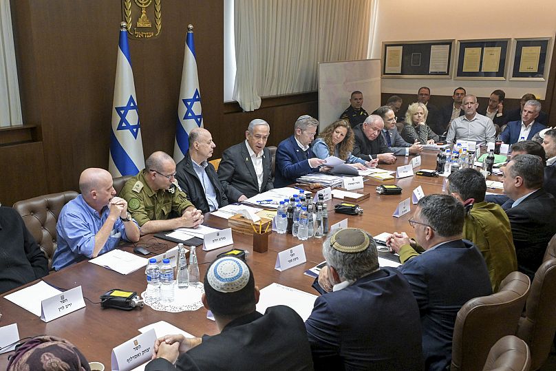 Israeli Prime Minister Benjamin Netanyahu, centre, convenes the Security Cabinet to vote on a ceasefire deal in Jerusalem, 17 January, 2025