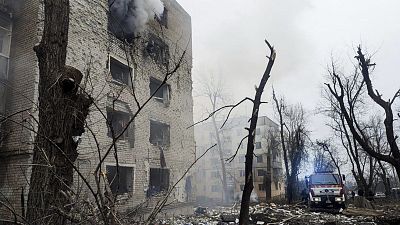 Firefighters put out the fire after a Russian rocket hit an apartment building in Kryvyi Rih, 17 January, 2025