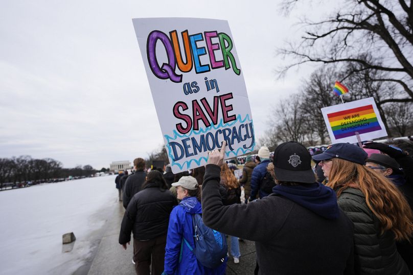 A group gathers at Franklin Park before the People's March, Saturday, Jan. 18, 2025, in Washington. (AP Photo/Julio Cortez)