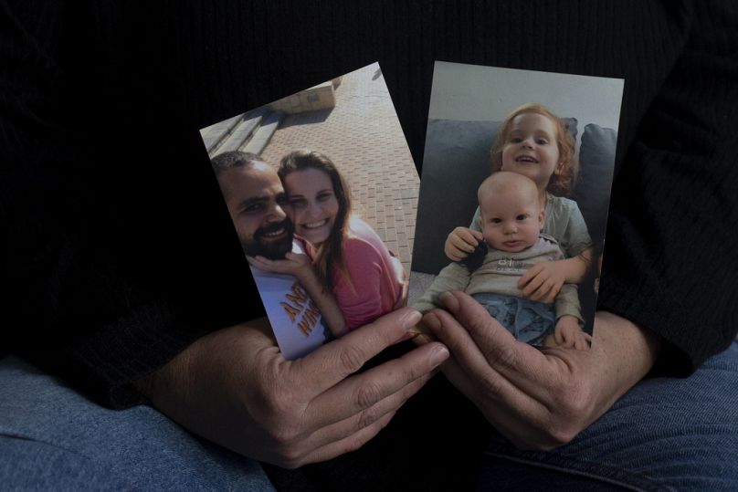 Yifat Zailer shows photos of her cousin, Shiri Bibas, her husband Yarden, and their children Ariel, and Kfir.