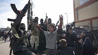 Members of the Izzedine al-Qassam Brigades, the armed wing of the Palestinian group Hamas, take part in a parade as they celebrate a ceasefire agreement, Jan 19, 2025
