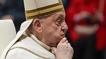 Pope Francis reacts during a solemn mass where he made 21 new cardinals in St. Peter's Basilica at The Vatican, Saturday, Dec. 7, 2024.