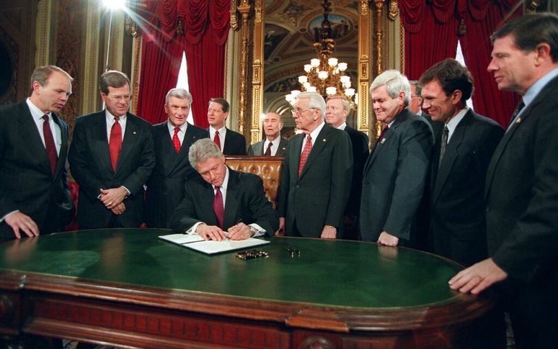 President Clinton signs the National Day of Hope and Renewal Proclamation on Capitol Hill Monday Jan. 20, 1997 after taking the oath for his second term