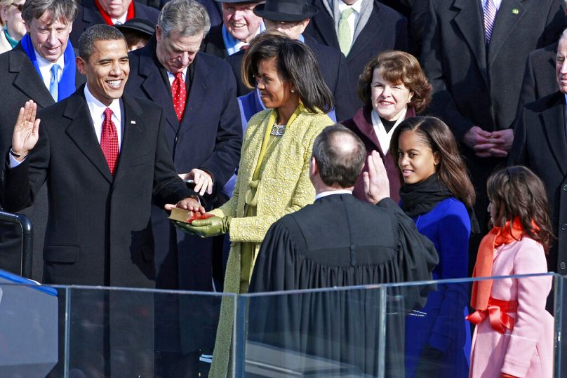 Barack Obama is sworn in by Chief Justice John Roberts as the 44th president of the United States as his wife Michelle looks on Tuesday, Jan. 20, 2009 in Washington