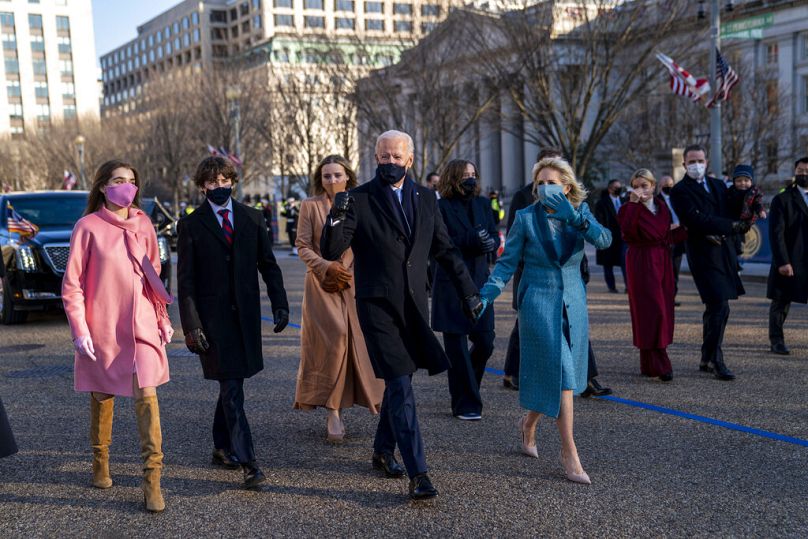 Joe Biden, First Lady Jill Biden and family, walk near the White House during a Presidential Escort to the White House, Wednesday, Jan. 20, 2021