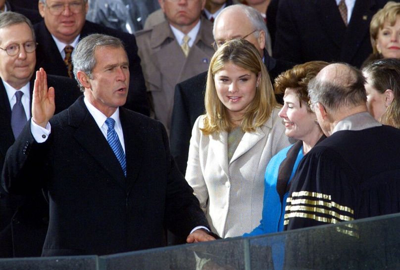 George W. Bush takes the oath of office from Chief Justice William Rehnquist to become the 43rd president Saturday, Jan. 20, 2001, in Washington