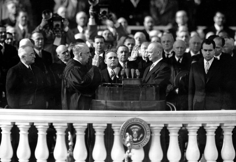 Dwight D. Eisenhower is inaugurated as President as U.S. Chief Justice Fred Vinson administers the oath of office during the ceremony in Washington. Jan. 20, 1953