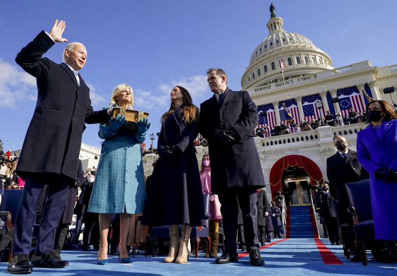 Biden sworn in as the 46th president of the United States by Chief Justice John Roberts as Jill Biden holds the Bible during the 59th Presidential Inauguration Jan. 20, 2021