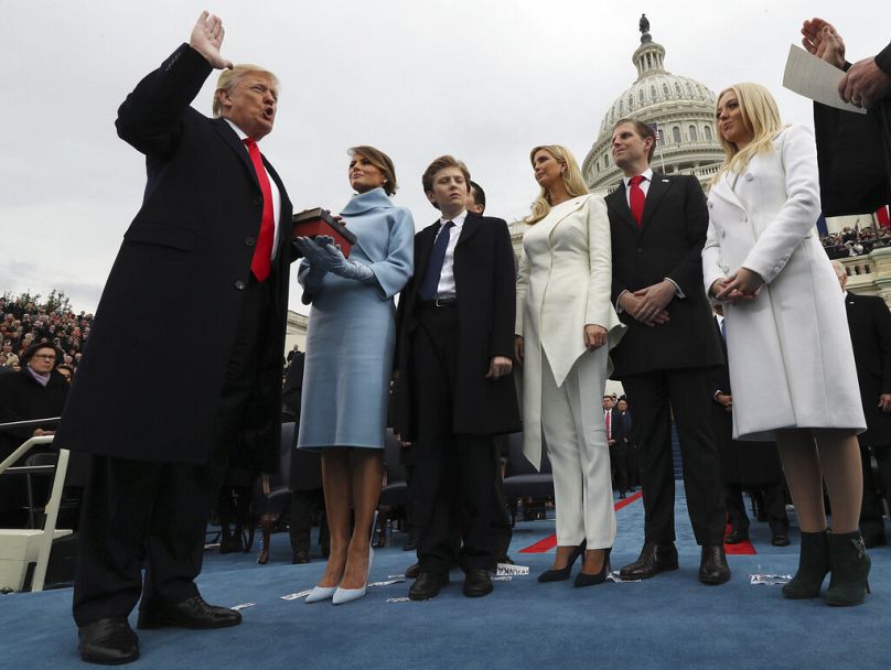 FILE - President Donald Trump takes the oath of office from Chief Justice John Roberts, Friday, Jan. 27, 2017 on Capitol Hill in Washington