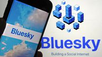 The app for Bluesky is shown on a mobile phone, left, and on a laptop screen, Friday, June 2, 2023, in New York