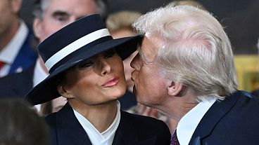 Melania Trump’s hat: Behind the awkward inauguration kissing moment  