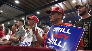 File picture of Trump supporters listening to a pre-election speech when he assured them he would put America's interests first