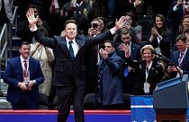 Elon Musk arrives on stage to speak at an indoor Presidential Inauguration parade event in Washington, Monday, Jan. 20, 2025.