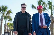 File- Donald Trump walks with Elon Musk before the launch of the sixth test flight of the SpaceX Starship rocket Tuesday, Nov. 19, 2024 in Boca Chica, Texas.
