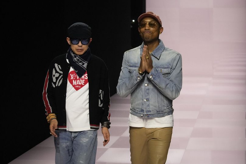  Pharrell Williams (right) walks with Nigo, Kenzo's artistic designer and co-creator of the collection, after the Louis Vuitton Fall-Winter 2025-2026 show in Paris.