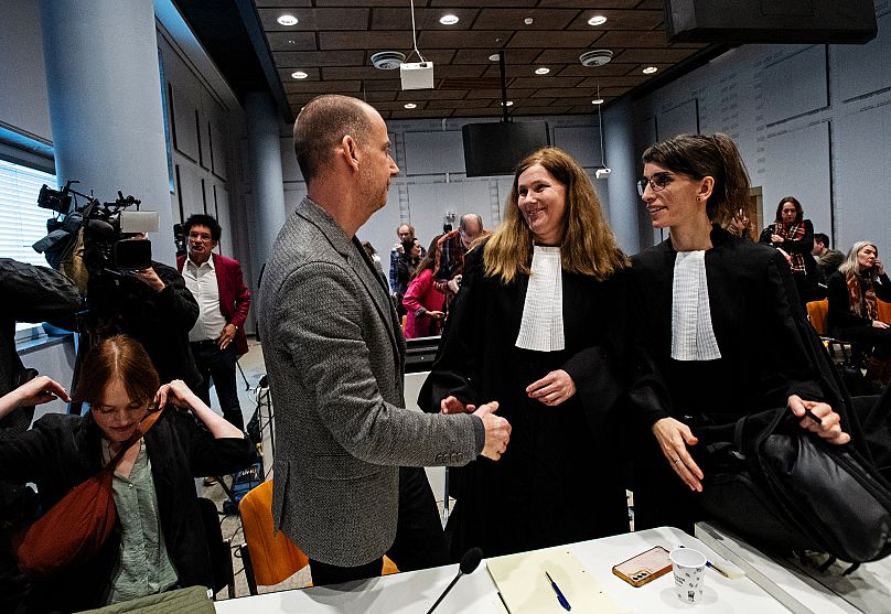 Andy Palmen, director Greenpeace Netherlands, Bondine Kloostra and Brechtje Vossenberg, lawyers at Prakken d'Oliveira.