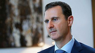 FILE - Syrian President Bashar Assad is pictured speaking during an interview with the Iran's Khabar TV, in Damascus, Syria, Oct. 4, 2015