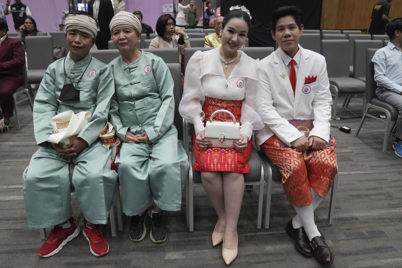 Couples from the LGBTQ+ community wait for their marriage certificates as the Marriage Equality Act takes effect.