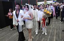 Couples from the LGBTQ+ community parade to a hall after the Marriage Equality Act took effect in Bangkok, Thailand, Thursday, 23 January 2025.