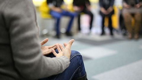 People in a therapy group.