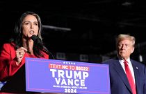 Tulsi Gabbard on the campaign trail with Donald Trump. 
