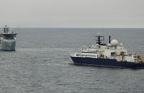 In a picture provided by the UK Ministry of Defence, a Royal Navy ship tracks Russia's Yantar vessel in the English channel
